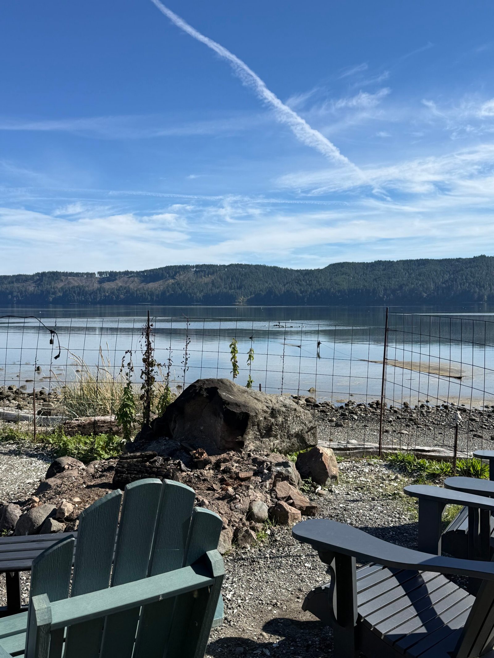 Outdoor chairs overlooking Hood Canal at Hama Hama