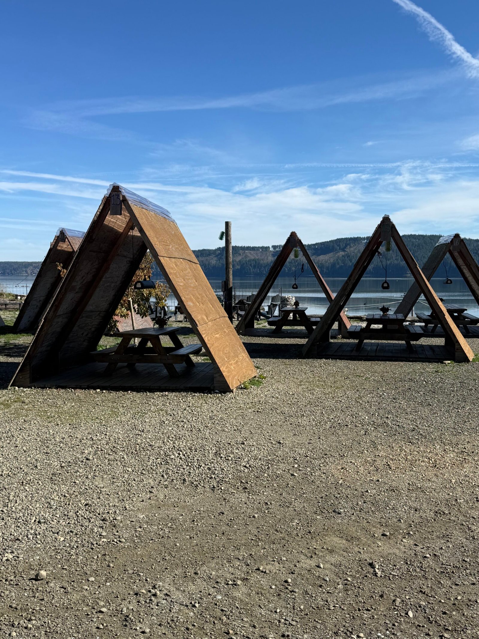 A-frame picnic shelters beside Hood Canal at Hama Hama