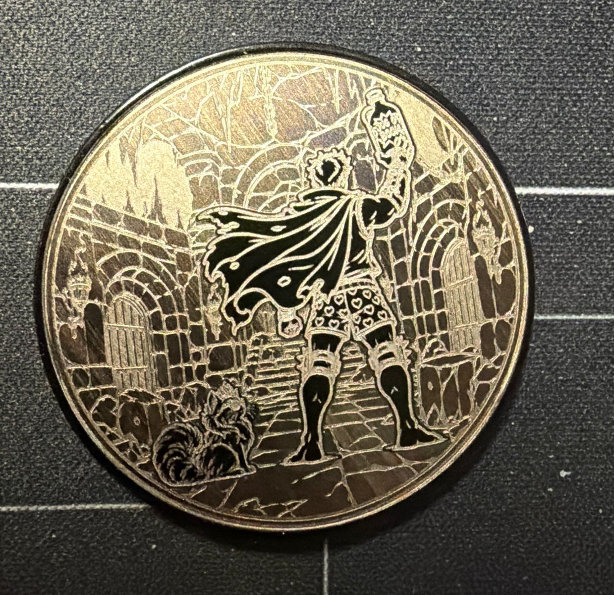 Detailed illustrated design on one of my anodized steel coin blanks