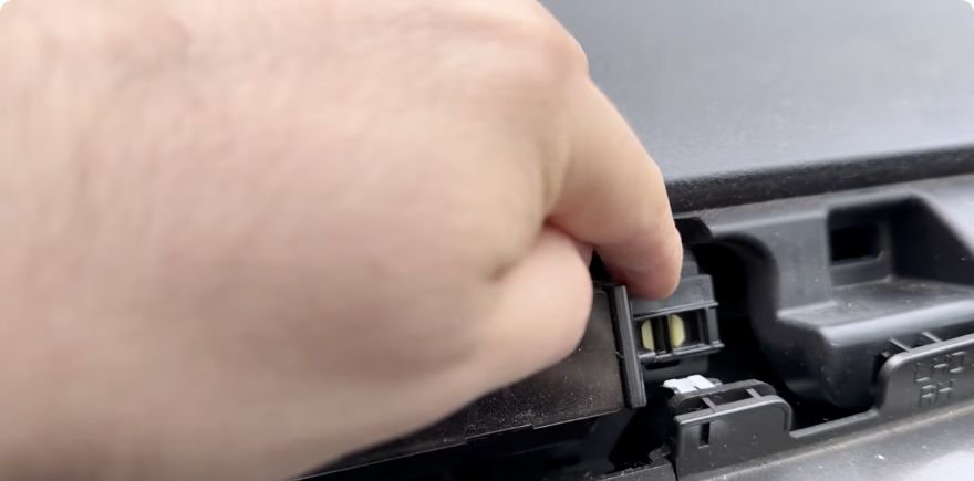 Factory RAV4 trim retaining clip during radio removal