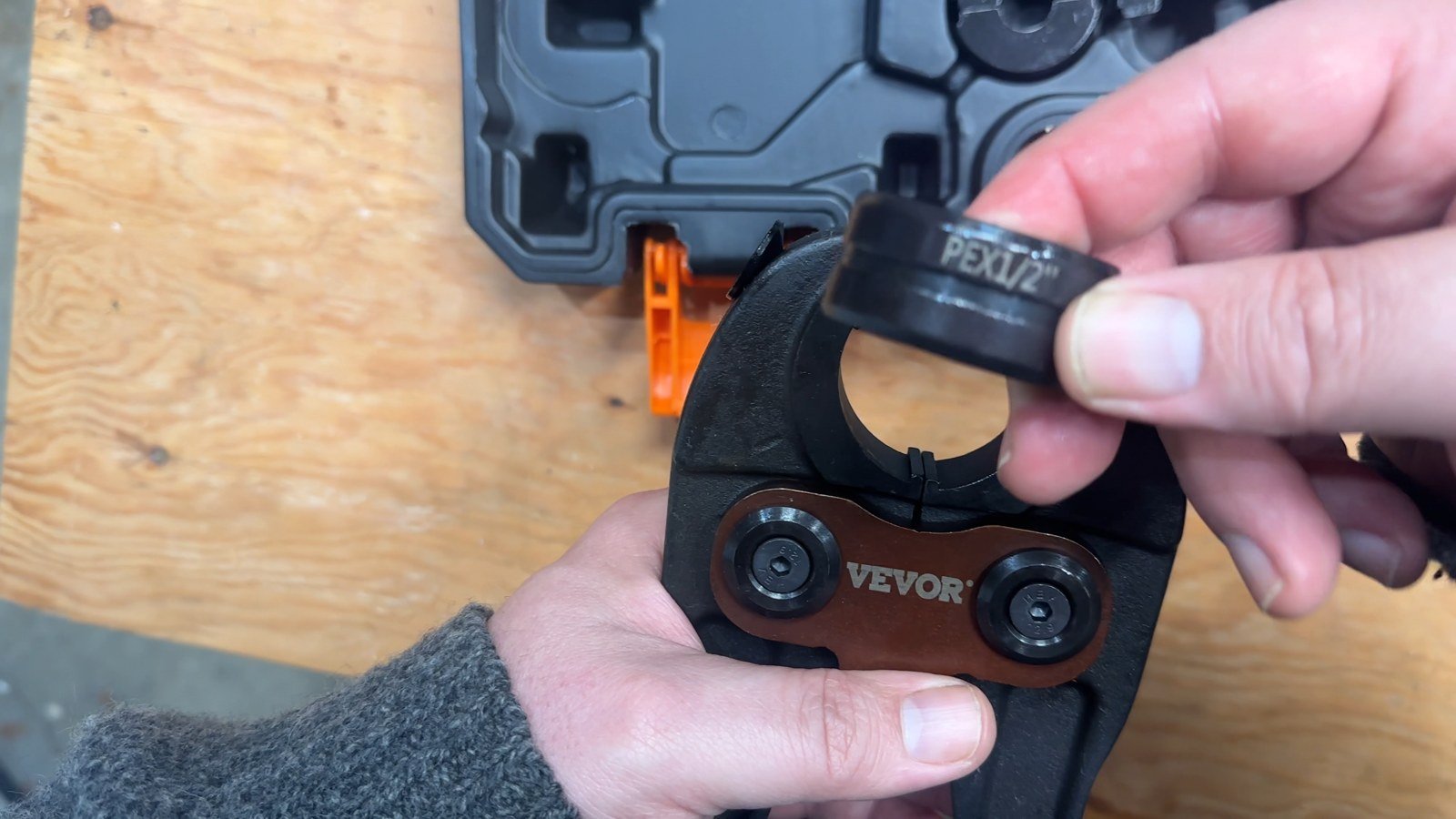 Selecting the die marked PEX 1/2 for the VEVOR hydraulic crimping tool